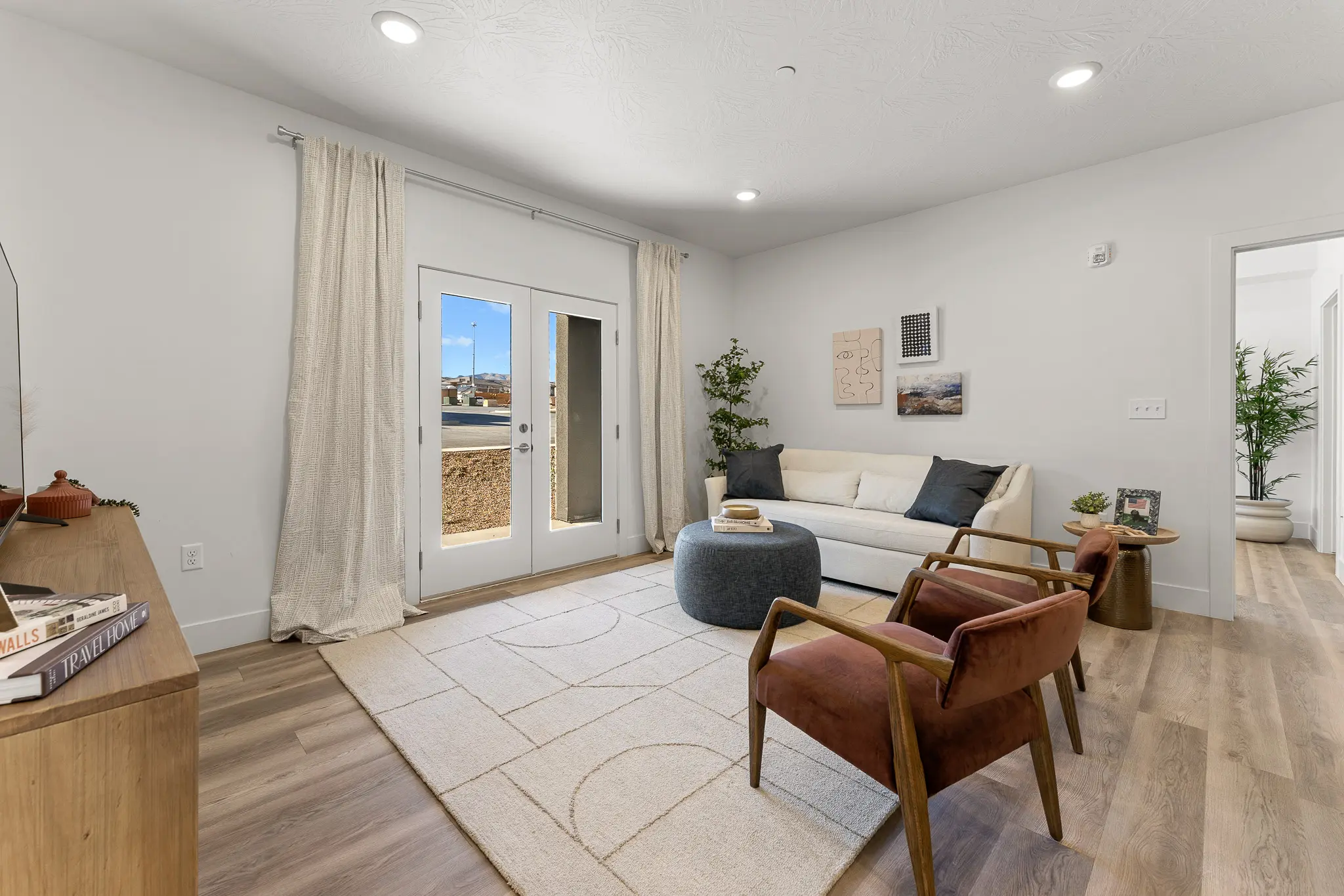 Spacious and modern apartment living area at Ascesa Court in St. George, UT.
