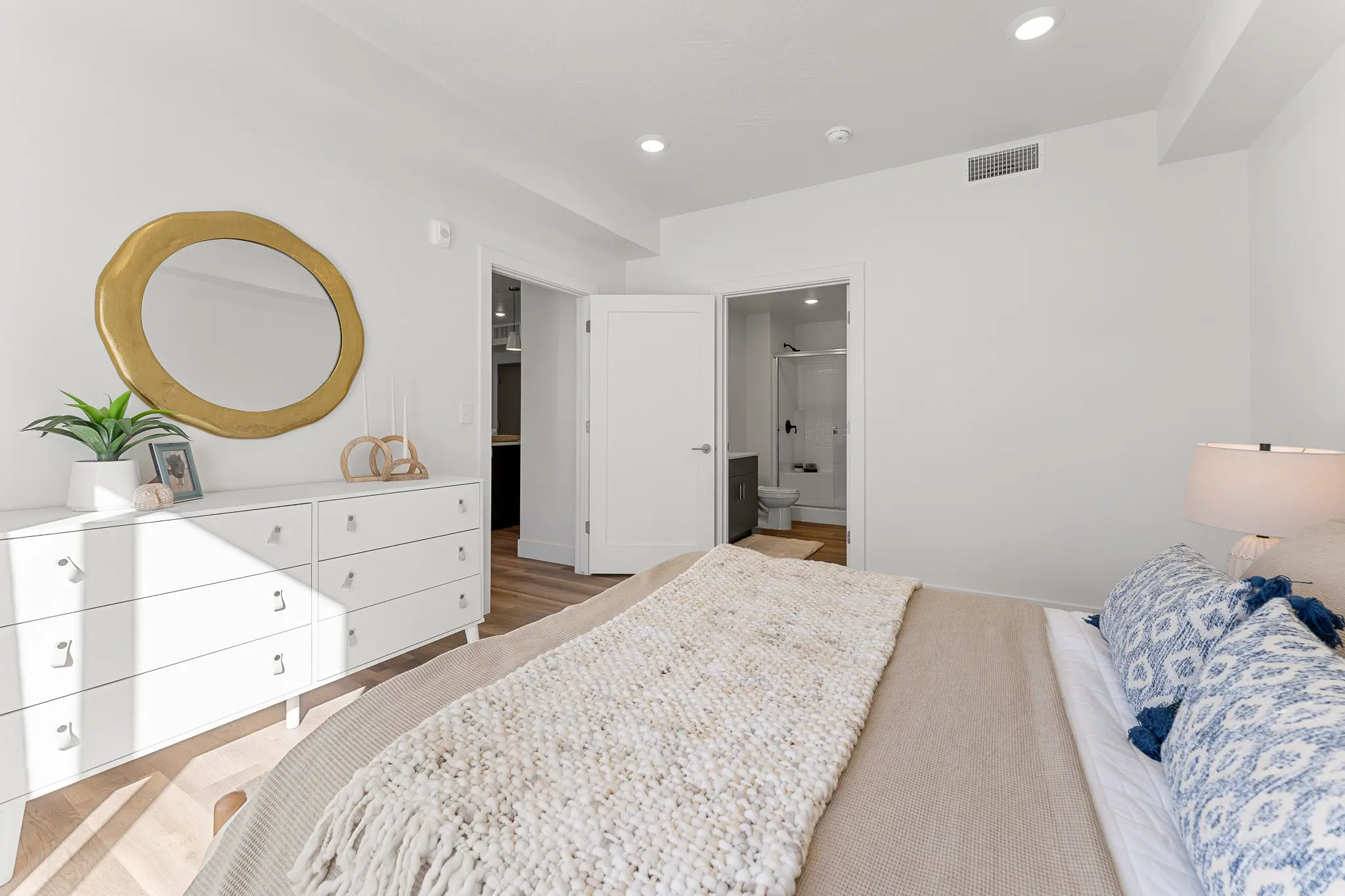 Spacious and modern apartment bedroom at Ascesa Court in St. George, UT.