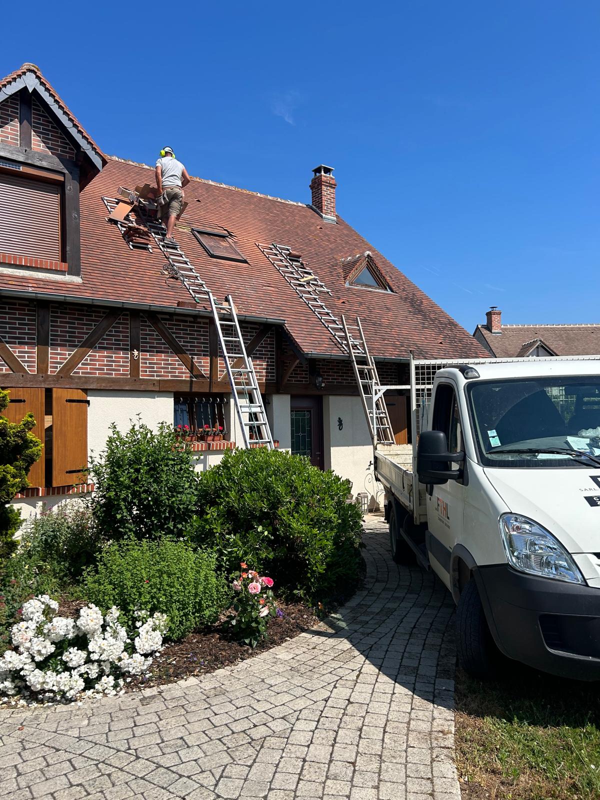 image of contractor on rooftop
