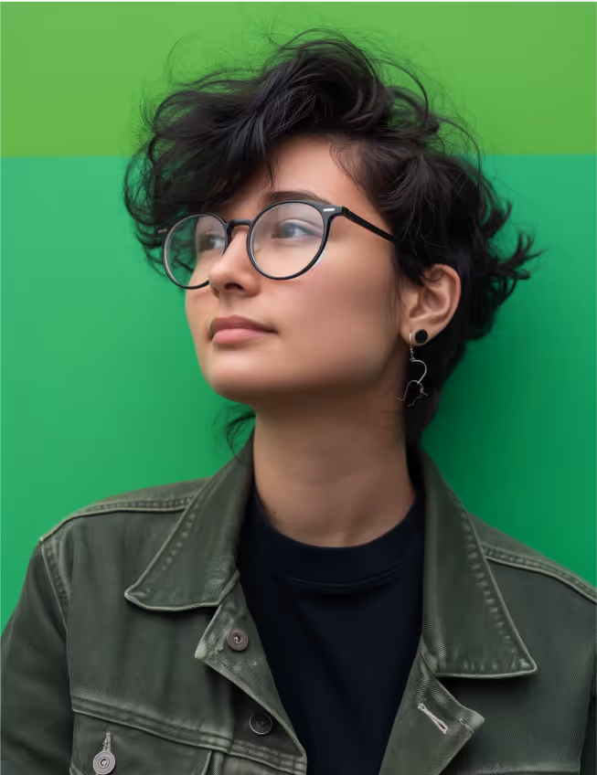 a woman with short hair wearing glasses