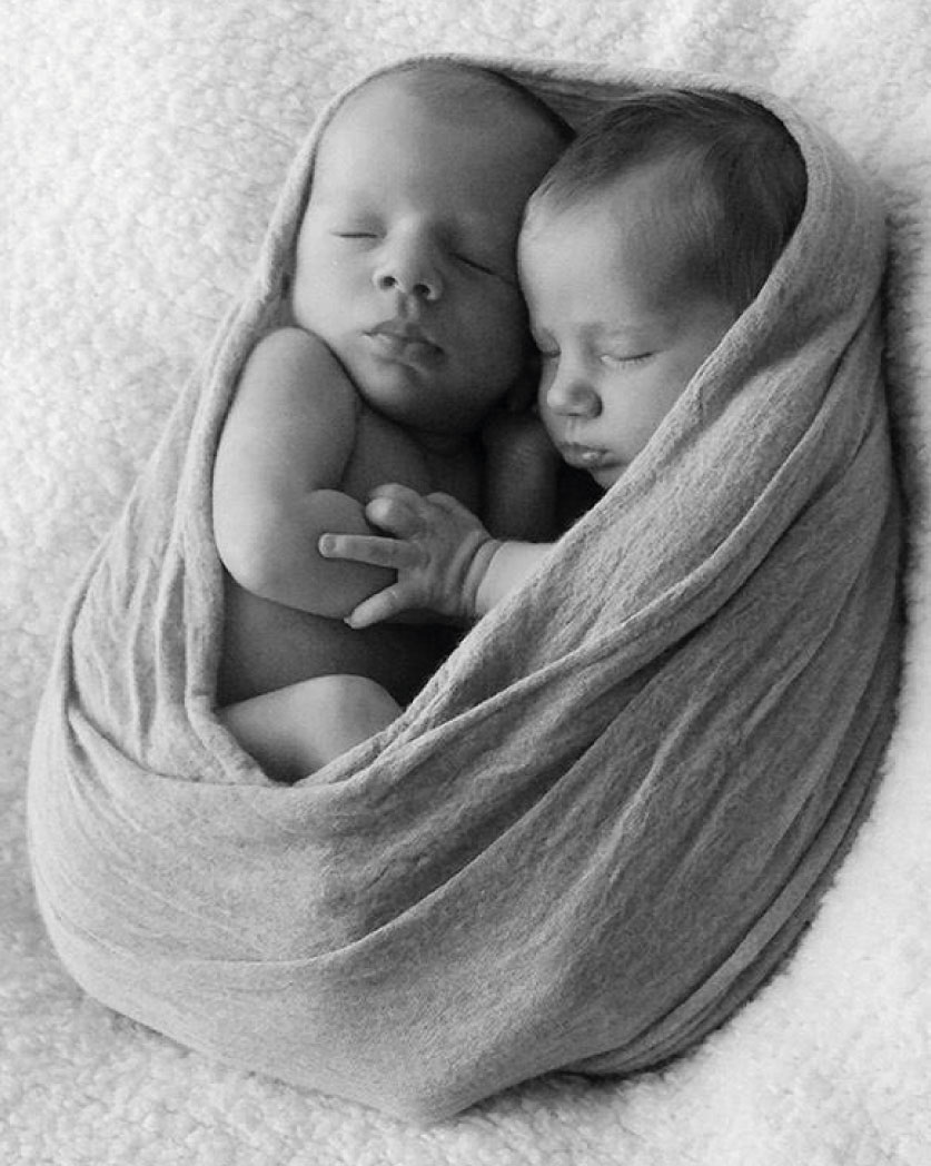 The Baby Consultancy - Maternity Nurse Services - Newborn twins wrapped in blanket