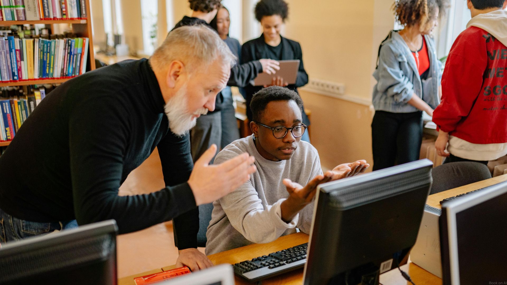 A teacher in a library using AI tools for engagement with students.