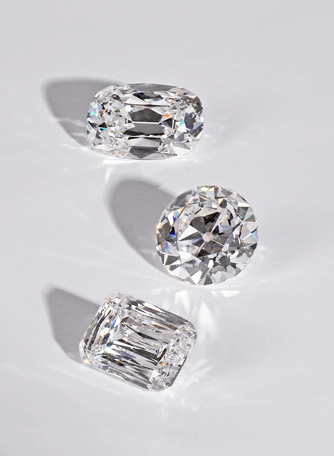 3 specialty cut lab diamonds: antique cushion, old European, antique hybrid.
