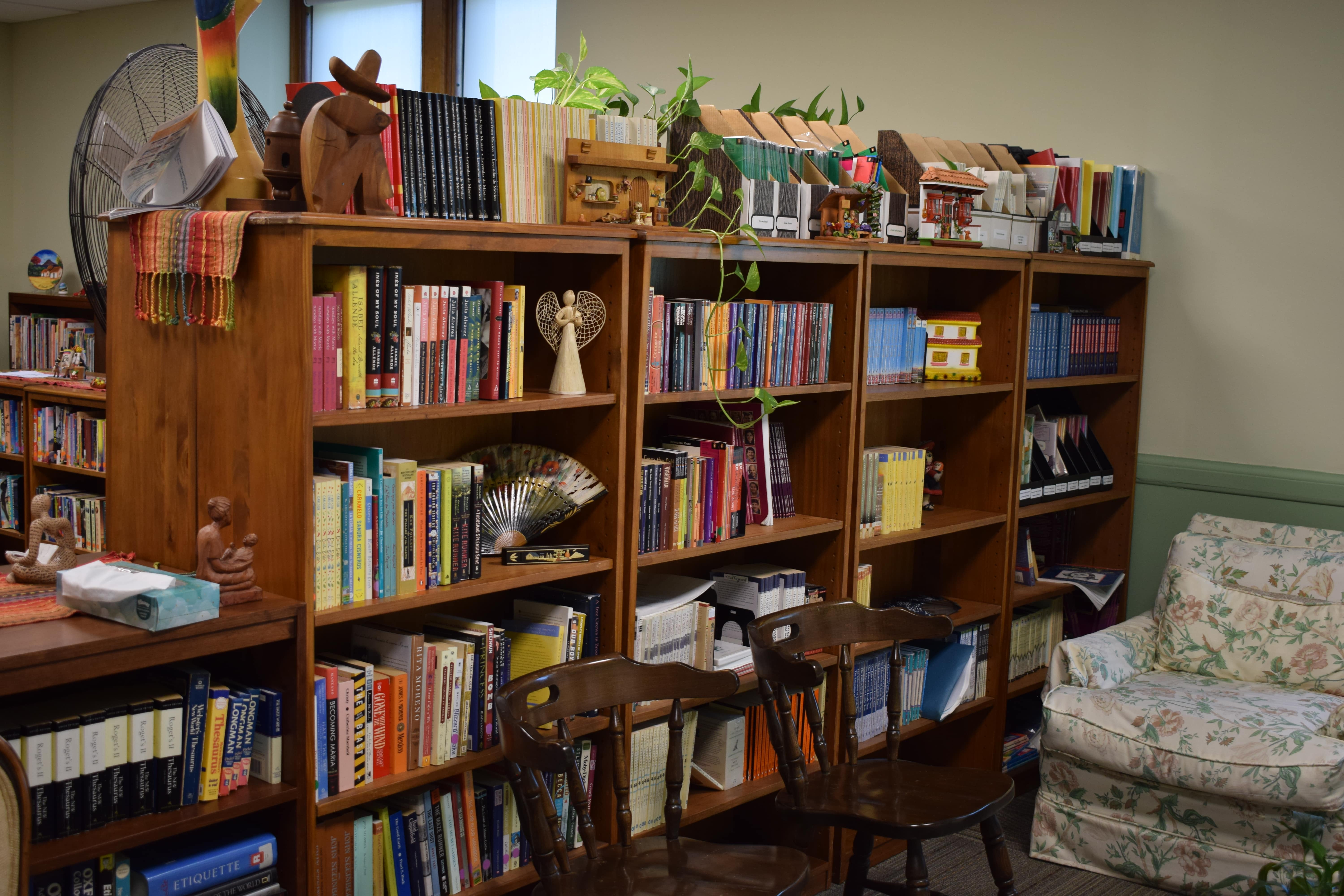 The bookshelf full of children's books at the TLC's library. 