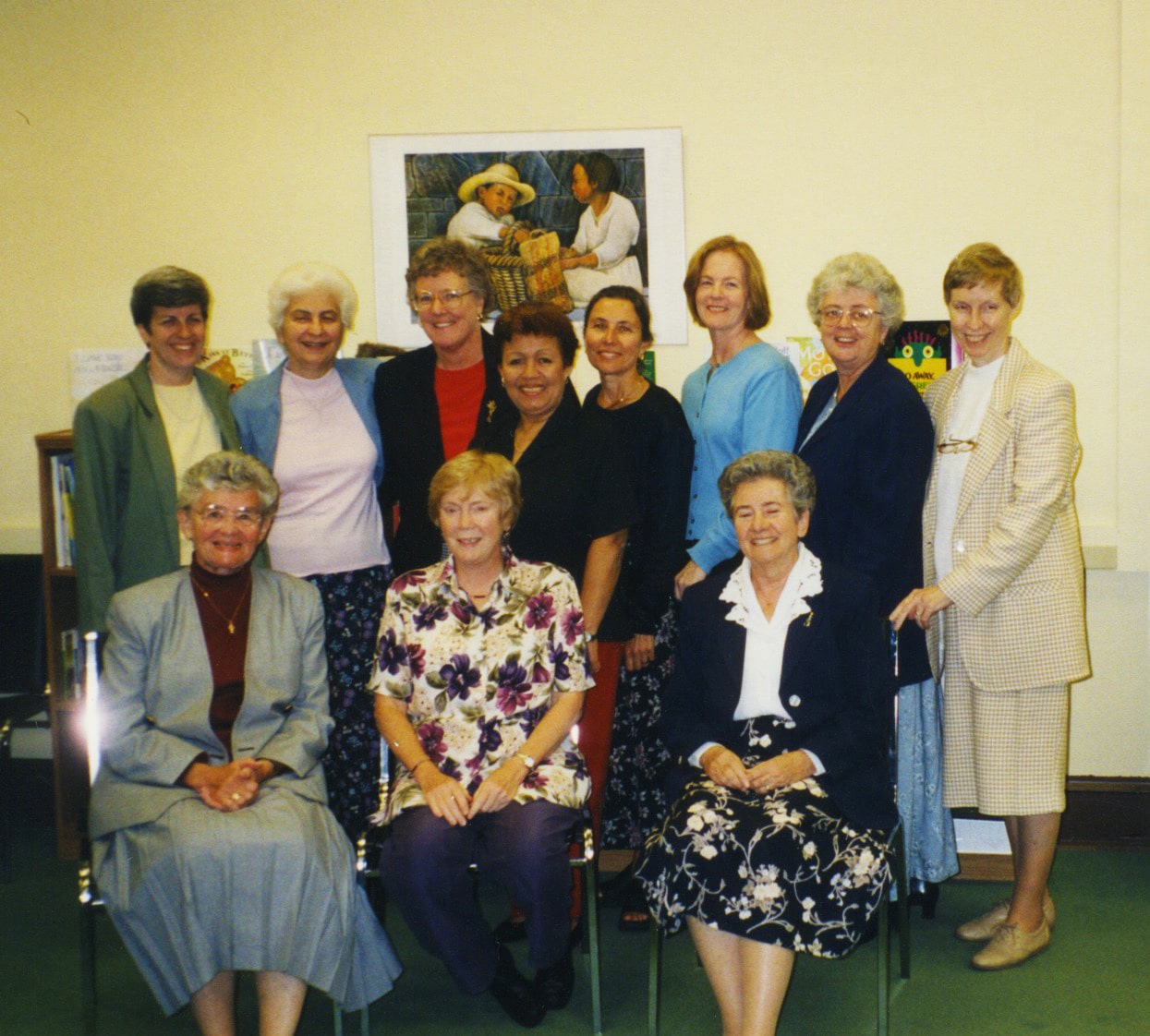 The first board of directors of the CSJ Learning Connection, posing together for a group photo.