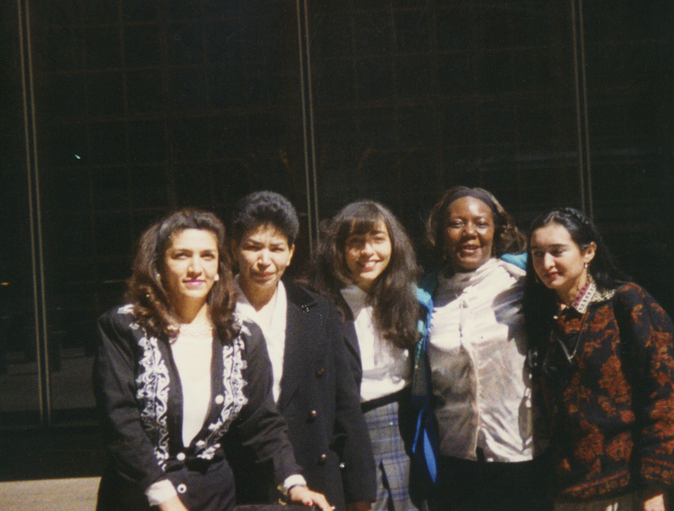 Five women standing together, looking at the camera; the first students of the CSJ Learning Connection.