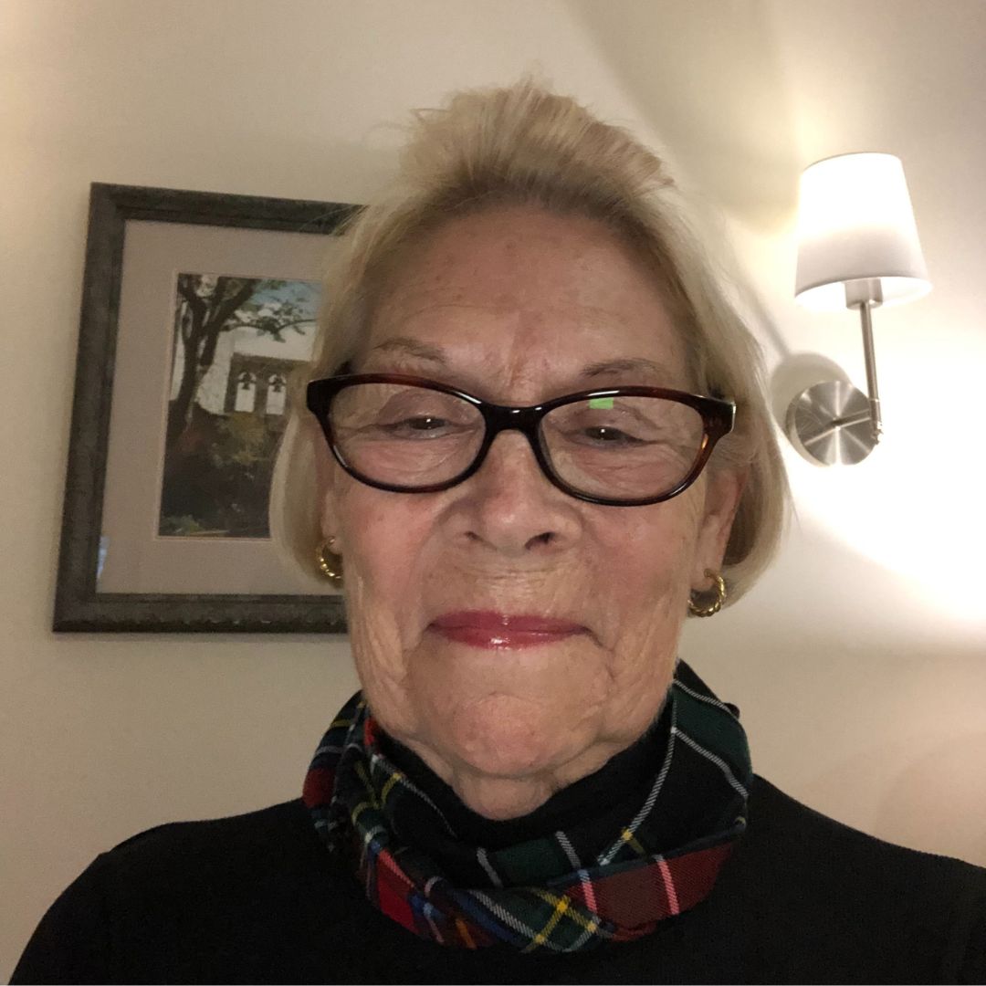 Joanne Forker's profile portrait, a woman looking at the camera.