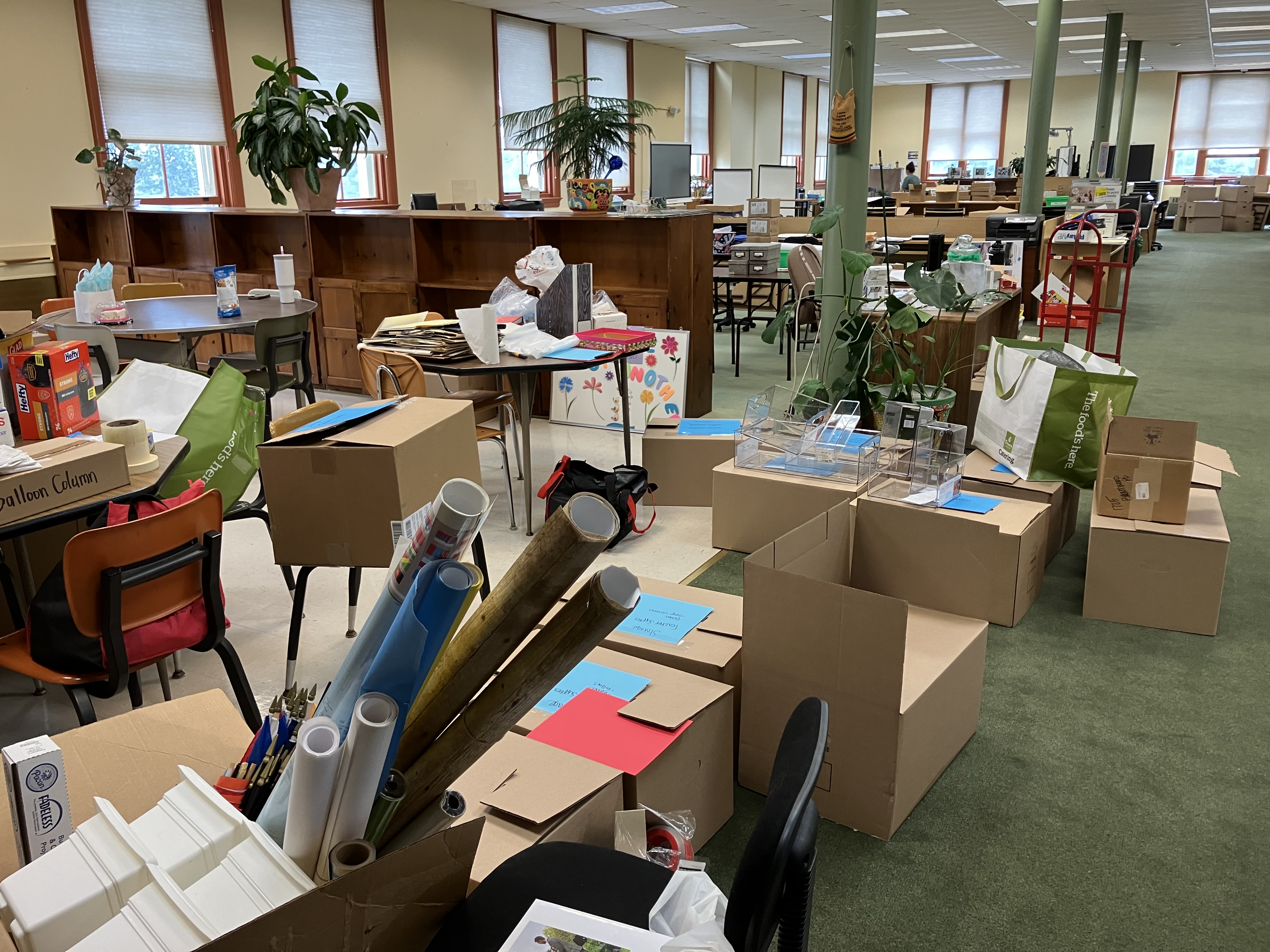 The boxes are brought into the library. 