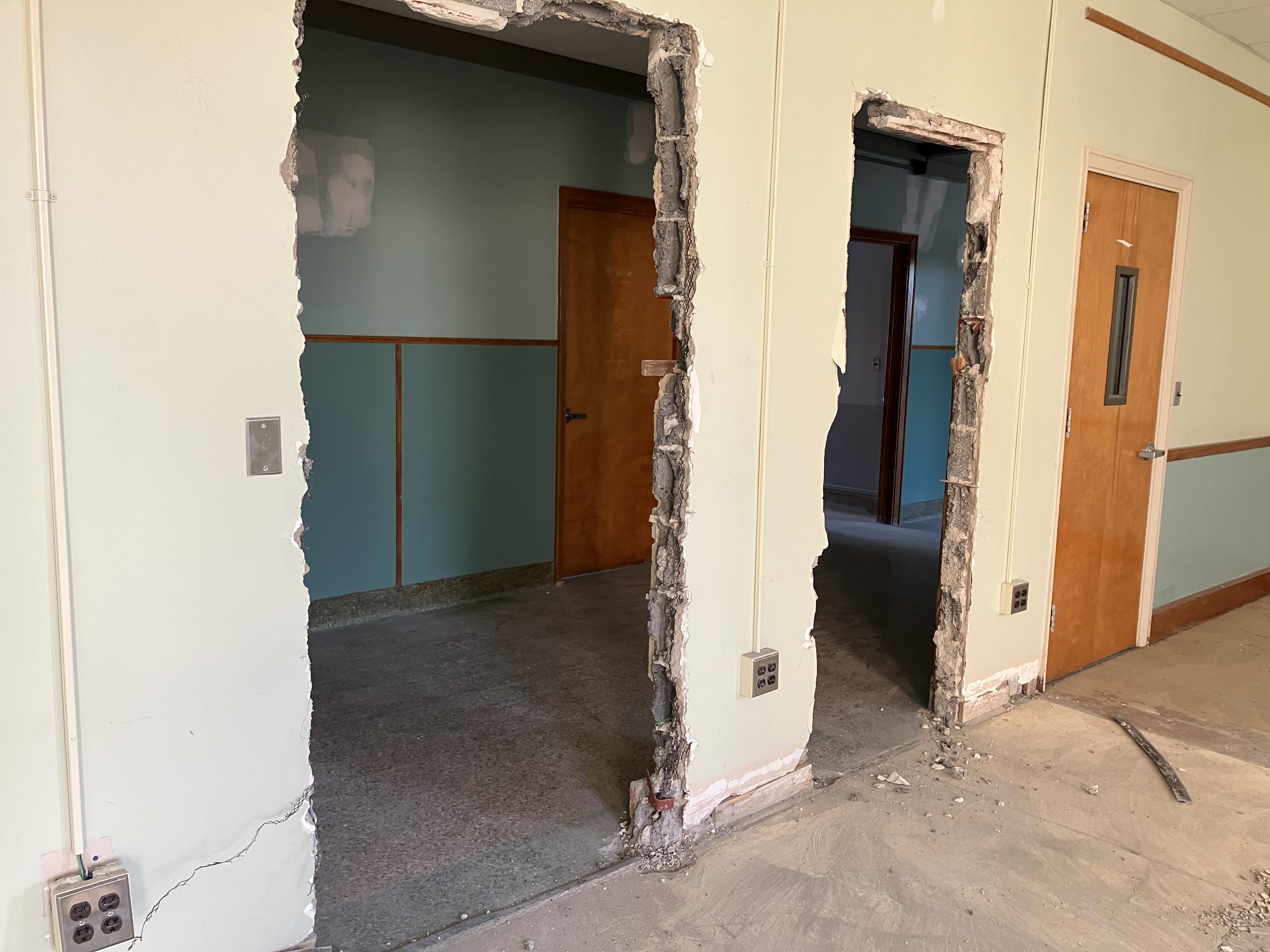 The new door is replaced at TLC, renovations. 