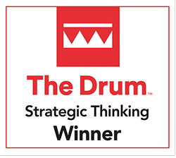 The Drum Strategic Thinking Winner logo with red and white design