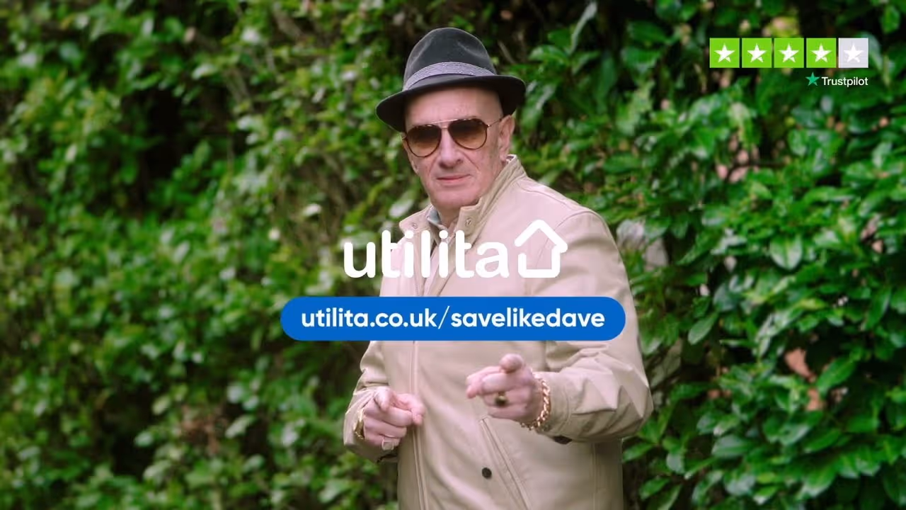 Older man in hat and sunglasses pointing at camera for Utilita energy savings