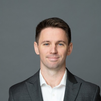 Tom Cummings professional headshot MBA program admission success story