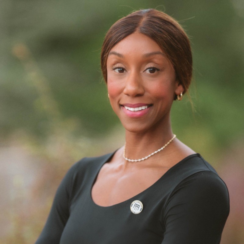 Professional headshot of Jasmine Morgan, MBA program admit and M7A client