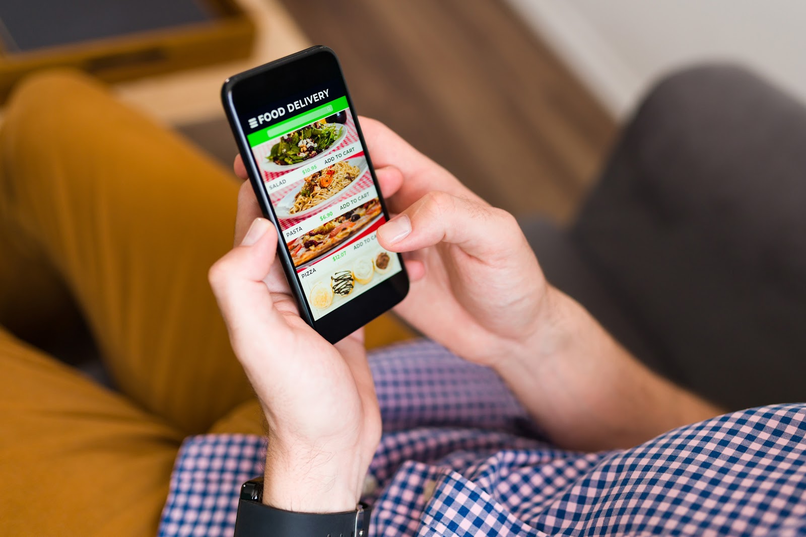A person browsing through a food delivery app 