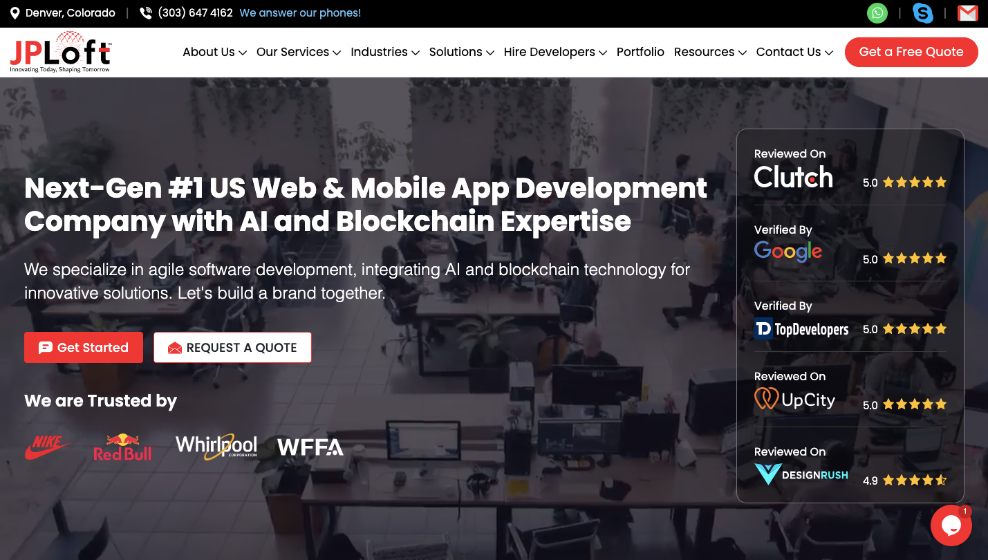JPLoft homepage showing a busy office space with overlay text highlighting AI and blockchain development services, along with trust badges from Clutch, Google, and others.