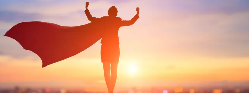 Silhouette of person with cape representing attributes of top performing advocacy program managers.