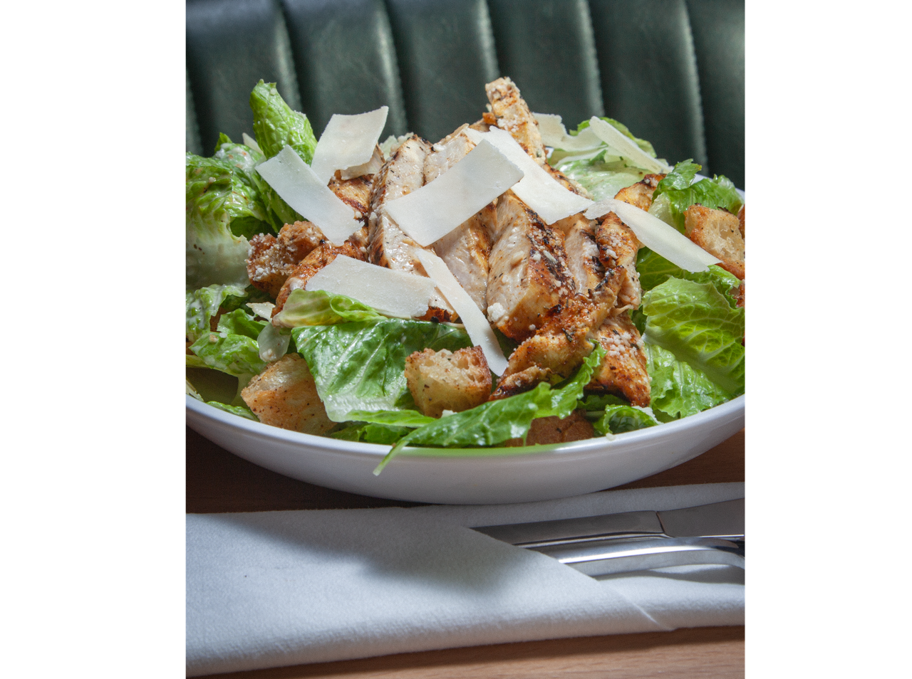 Crispy fried croquettes served on a white plate with roasted garlic aioli dipping sauce at DeWolf Brewing, Victor NY