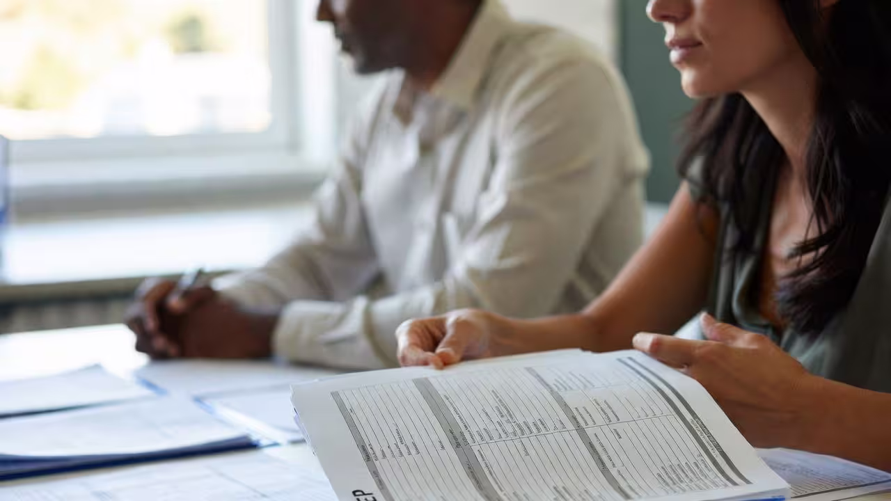Parent discuss about IEP goals during a school meeting