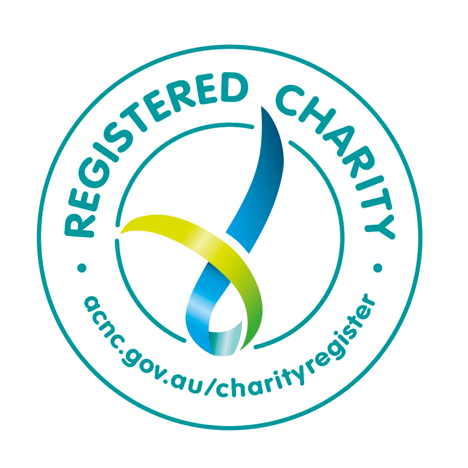 ACNC Registered Charity logo with a blue and green ribbon-like symbol and the URL acnc.gov.au/charityregister inside a circular border.