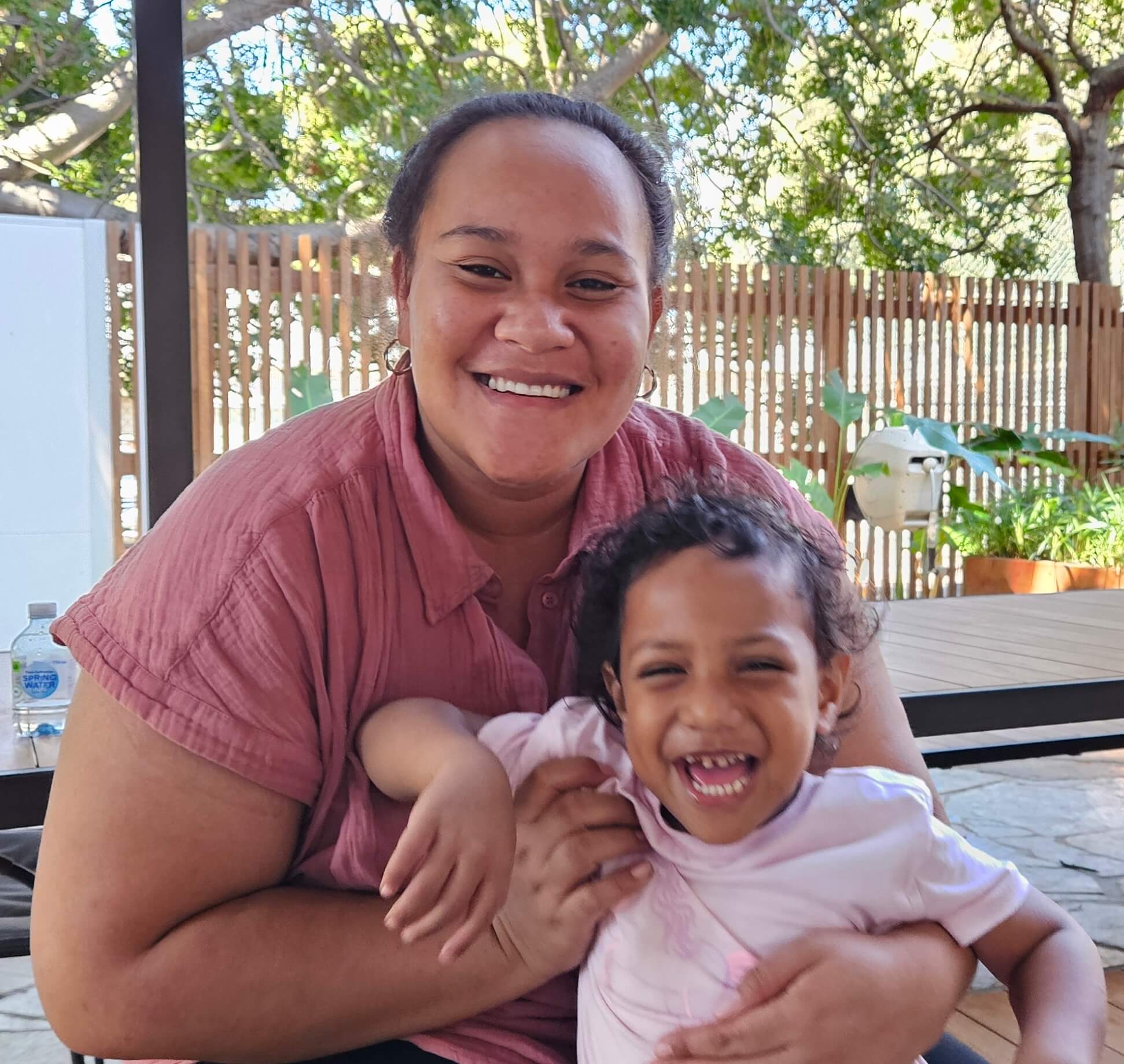 Woman smiling with child