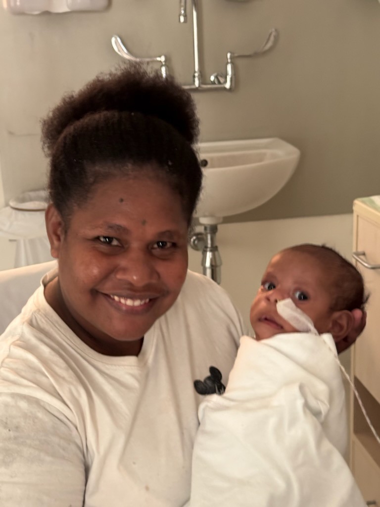 Woman smiling with child