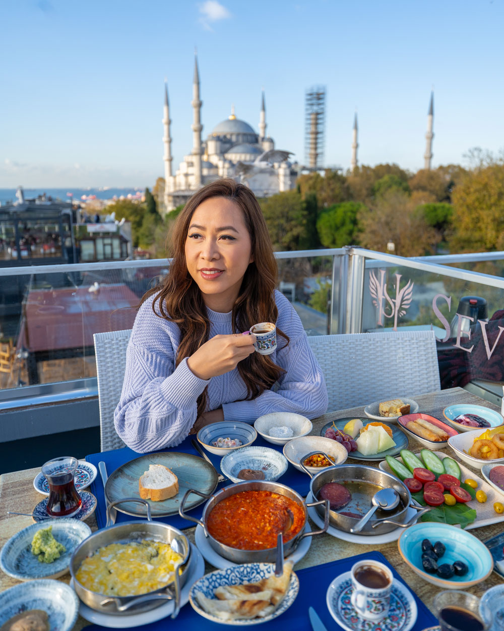 Istanbul skyline with historic mosque and waterfront at sunset, showcasing a luxury travel destination