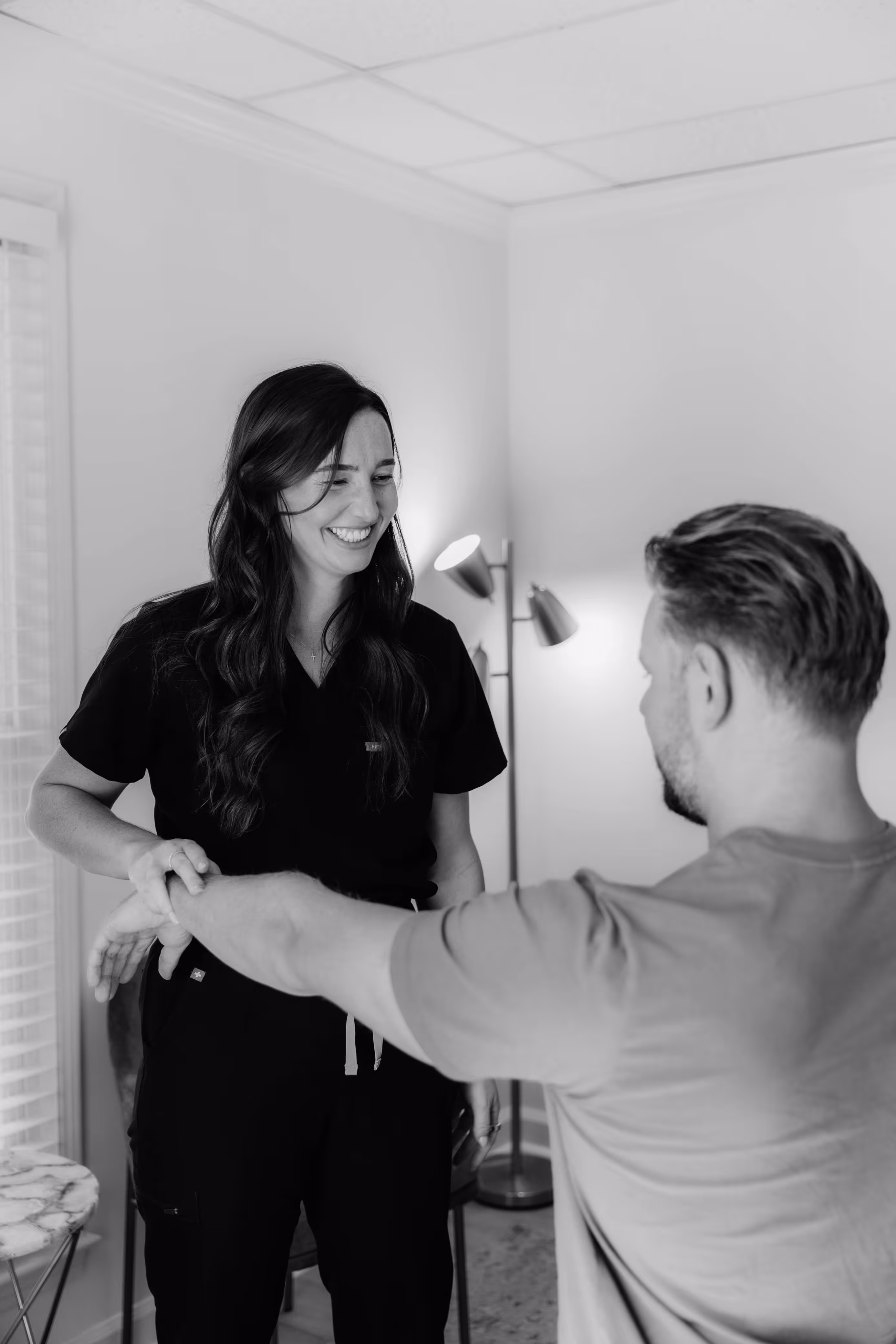 Apex practitioner providing chiropractic and QNRT therapy — integrating spinal alignment and neurological reset for wellness.