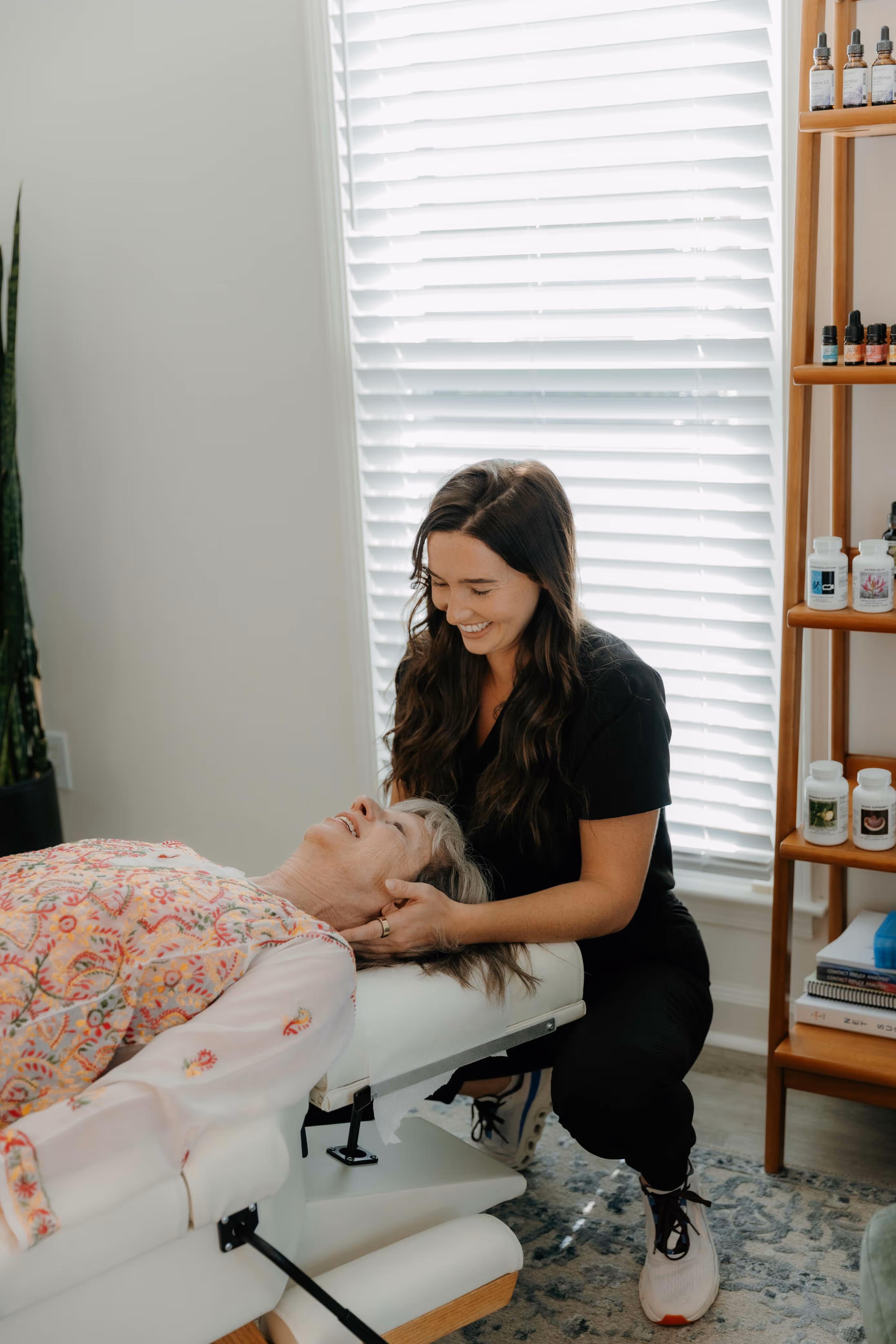 Apex practitioner providing chiropractic and QNRT therapy — integrating spinal alignment and neurological reset for wellness.