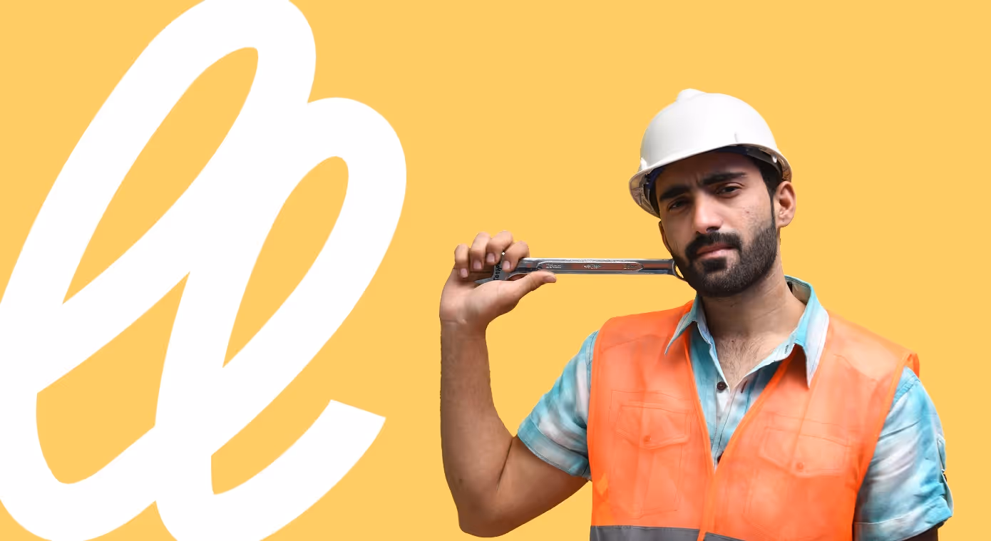 construction project manager in hardhat on yellow background