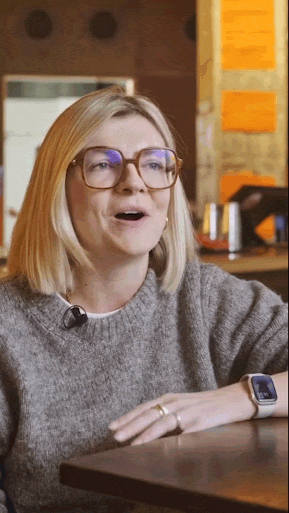 Screenshot of a woman being interviewed