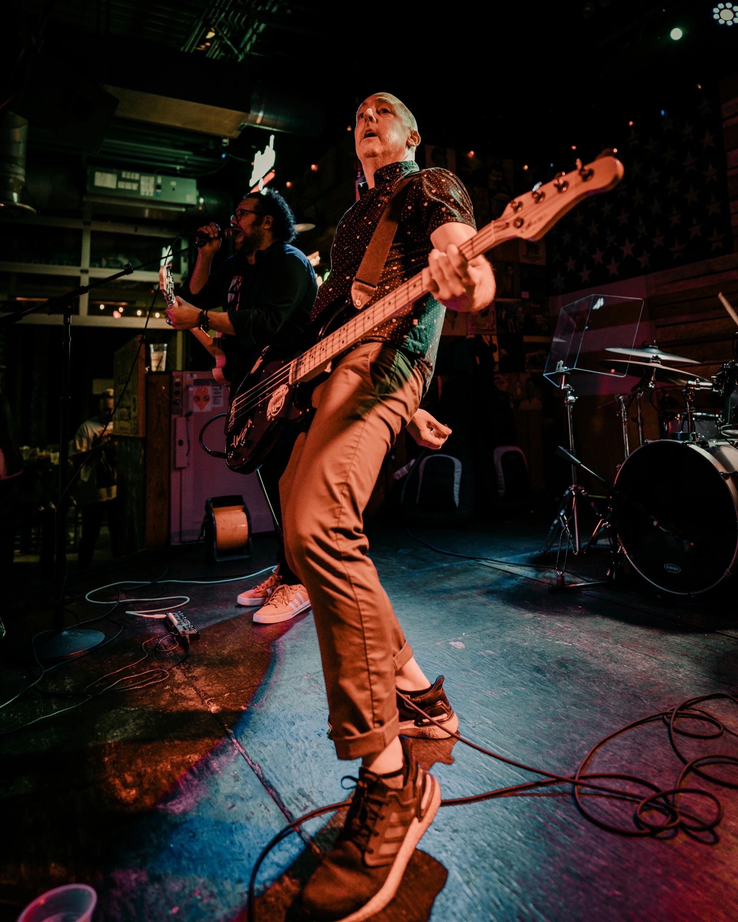 Two male artists performing on stage