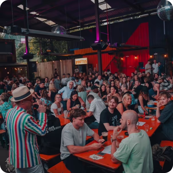 A crowd in front of a quiz master
