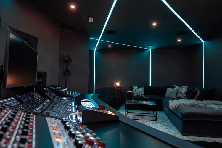 The company logo for Qube shines brightly, illuminated by a soft light, creating a striking visual impact