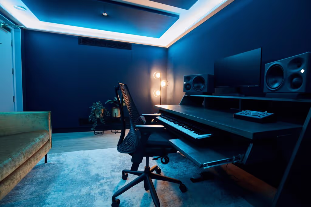 A workspace featuring a desk with a keyboard and computer, creating an organized and functional environment