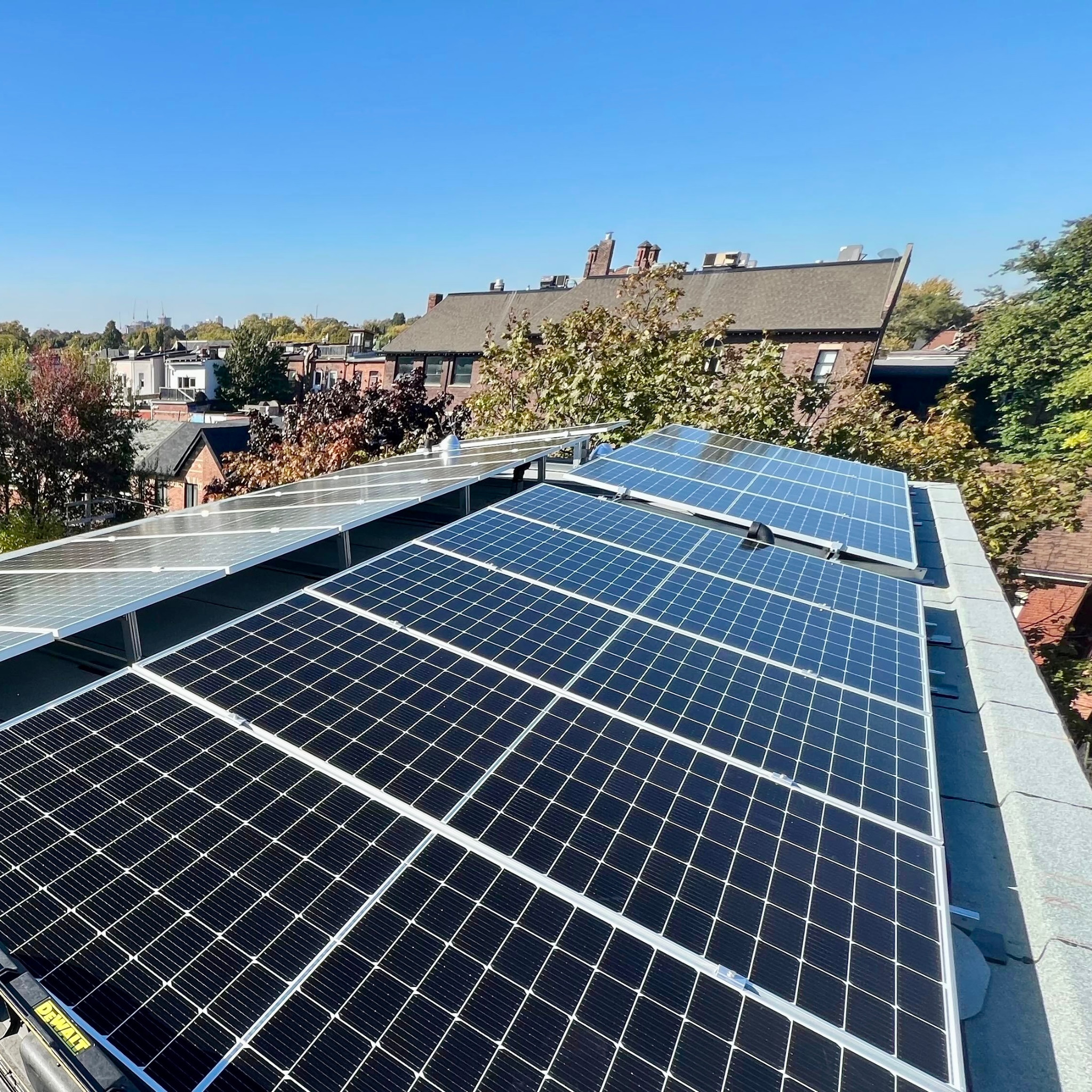 Rooftop solar panels above a Toronto residential neighbourhood