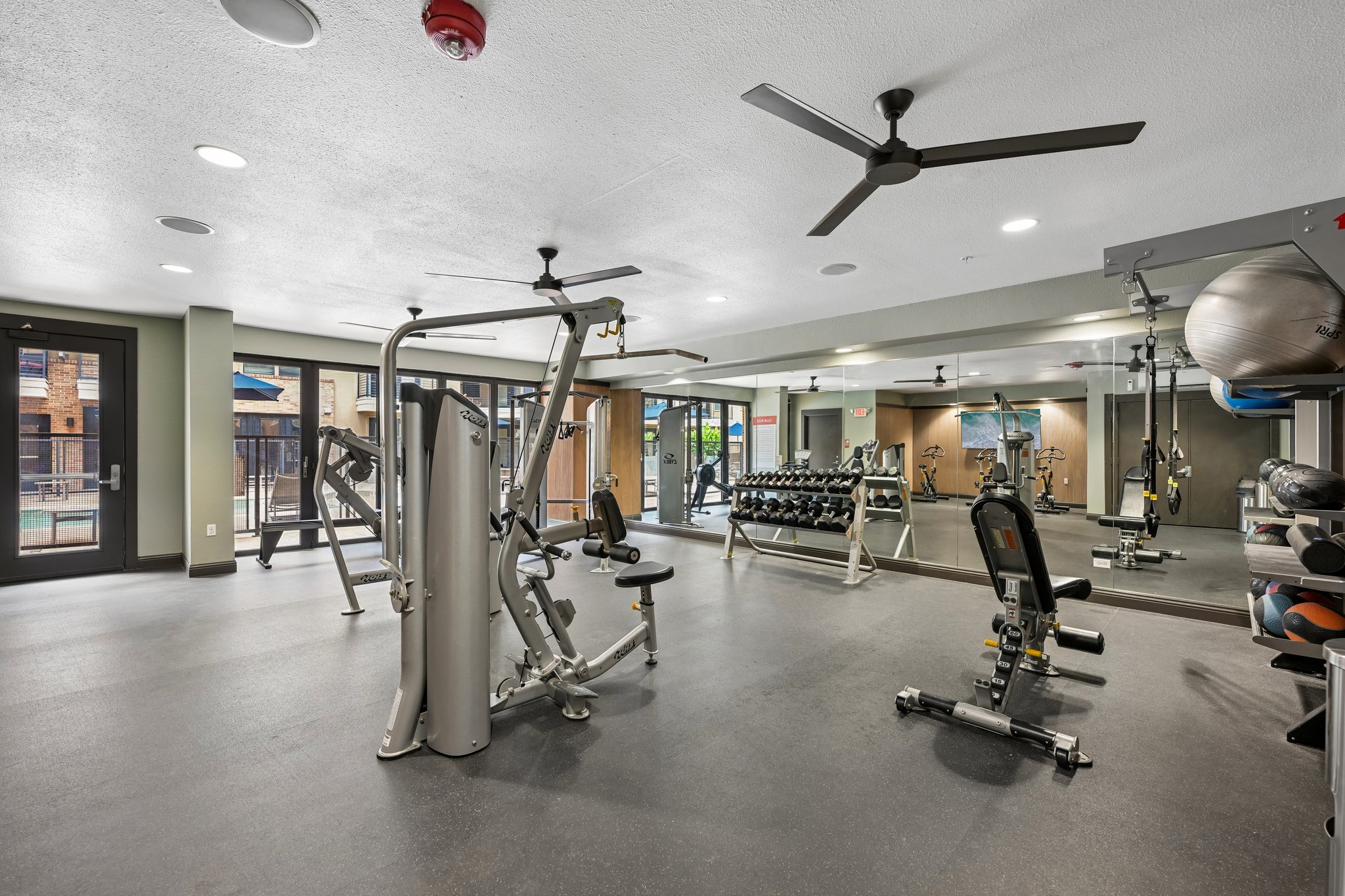 Gym with weight machines and yoga balls