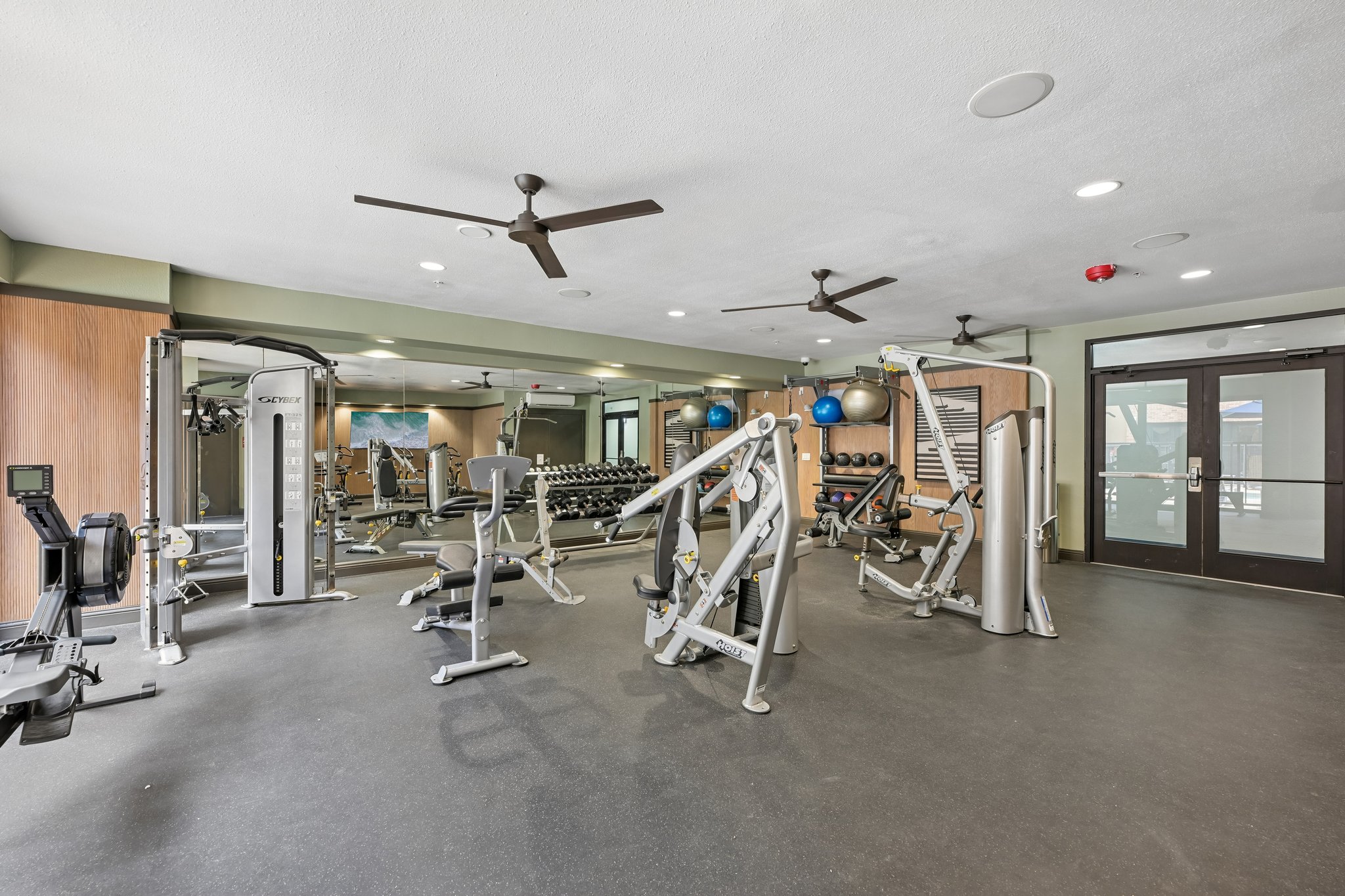 Gym with weight machines and yoga balls
