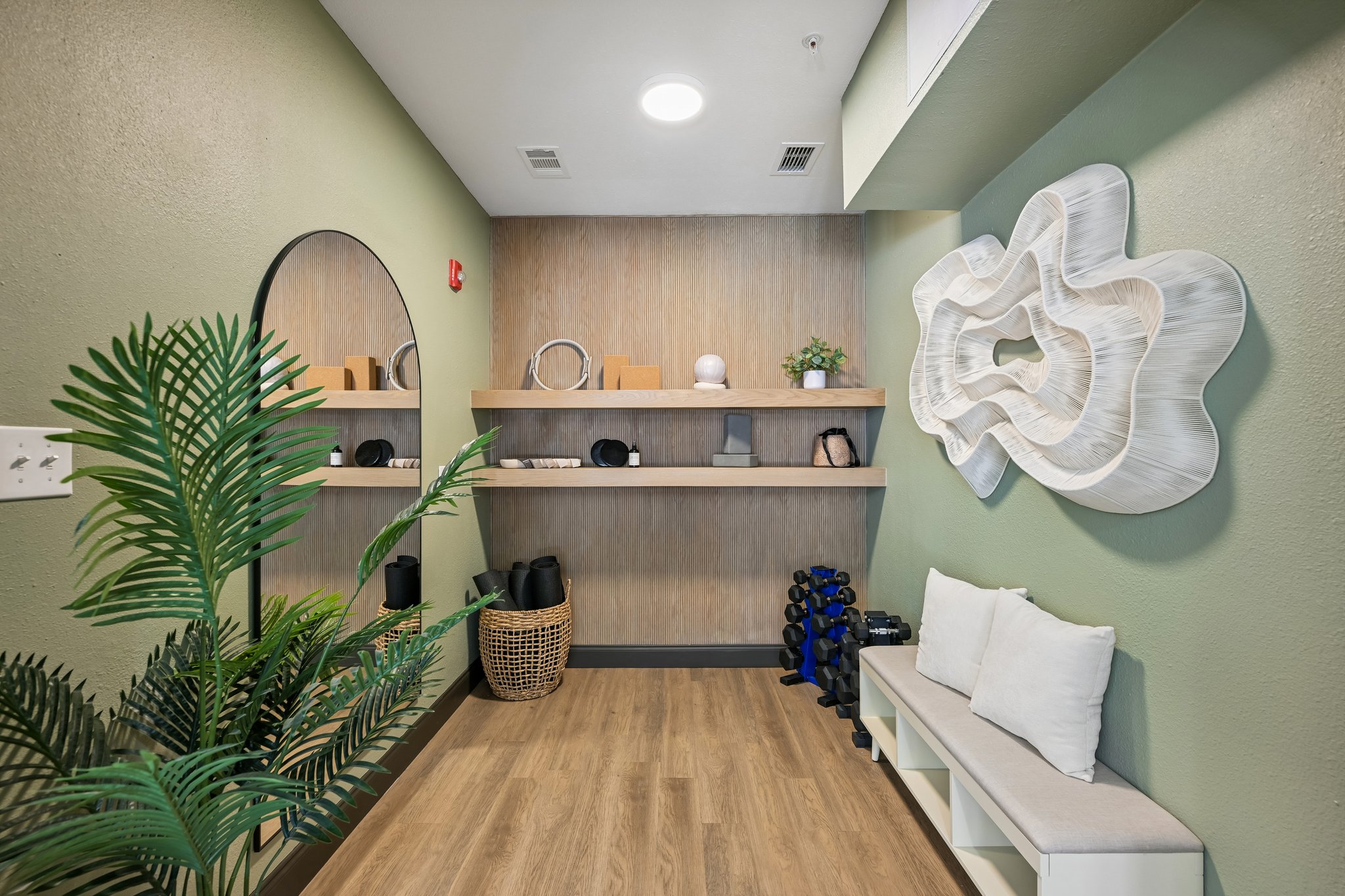 Yoga studio with mats and dumbells