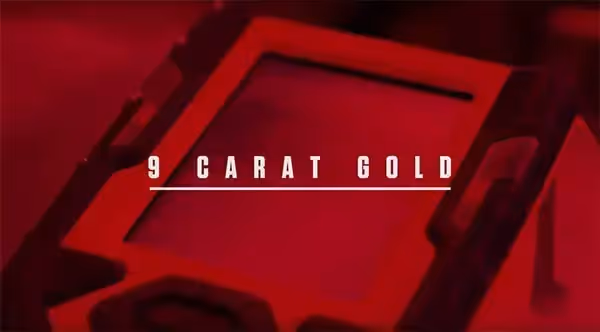 A slide that says 9 carat gold