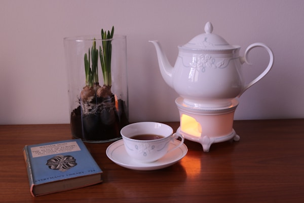 A cup of tea on a March morning; narcissi growing and waiting to bloom. An antiquarian book waiting to be read.