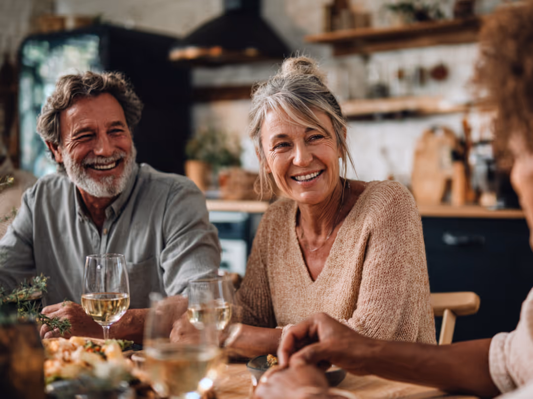 Couple having dinner with family