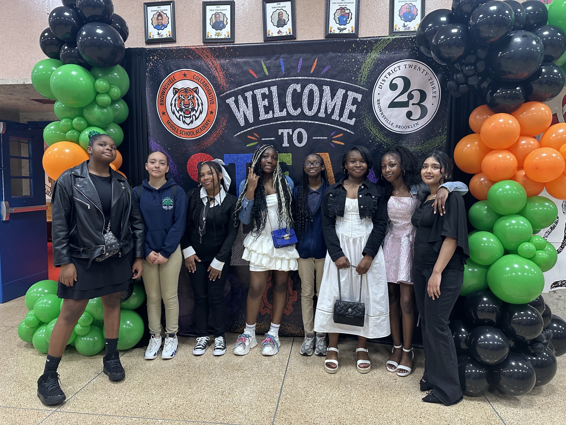Students posing at Brownsville Collaborative Middle School Academy welcome event