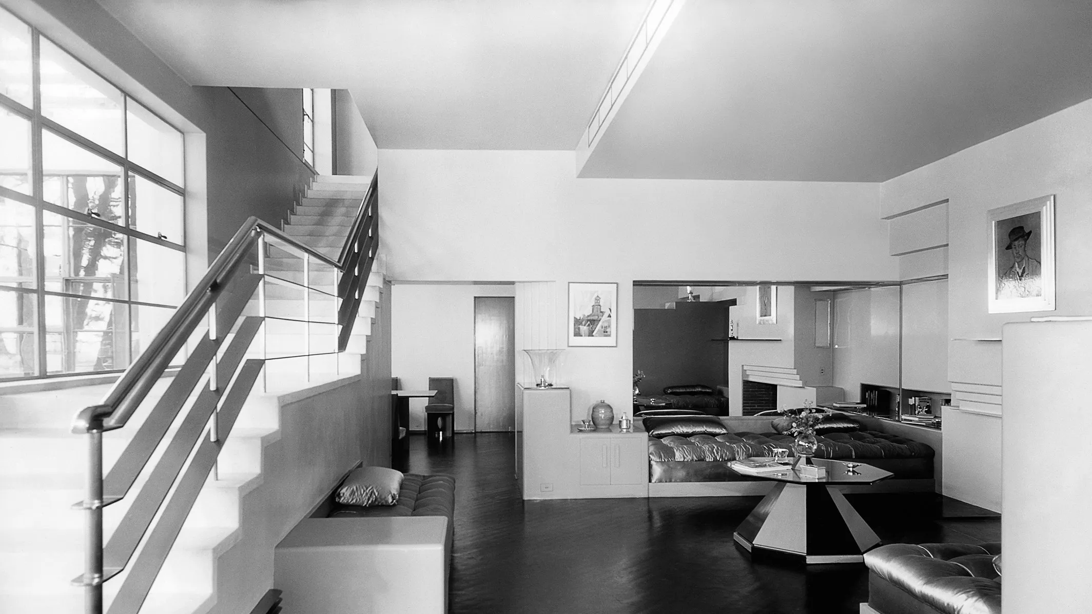 Image may contain Housing Building Indoors Flooring Loft Staircase Interior Design Living Room Room and Floor