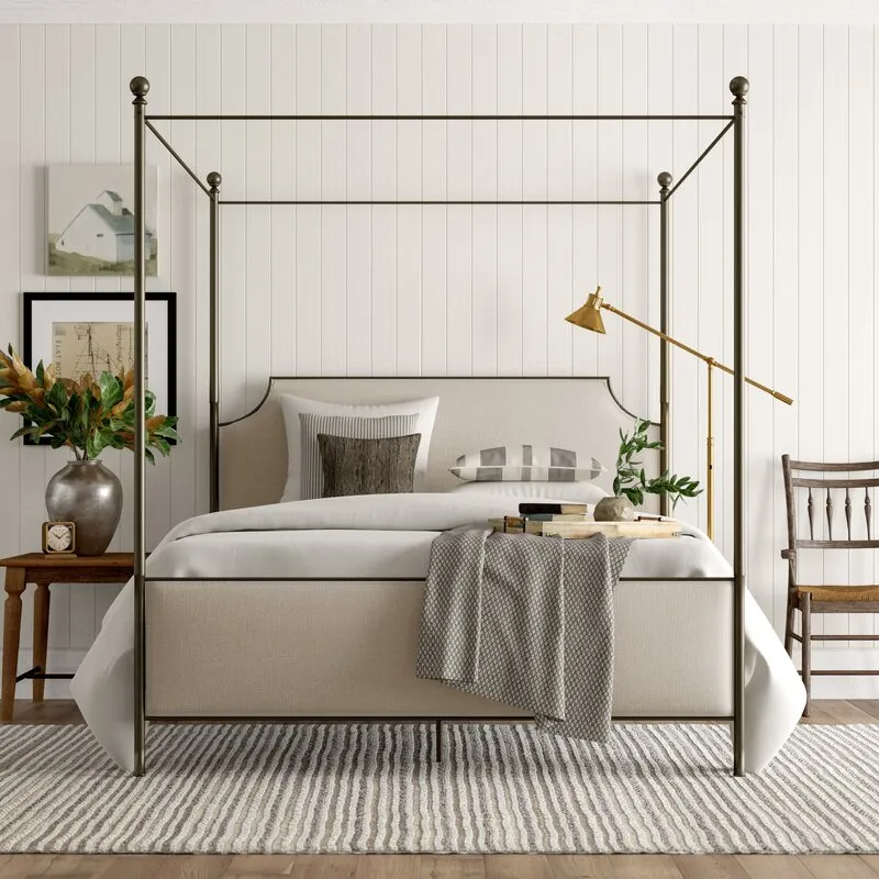 Perran Upholstered Canopy Bed- come explore coastal cottage bedroom ideas with furniture and decor resources on Hello Lovely!