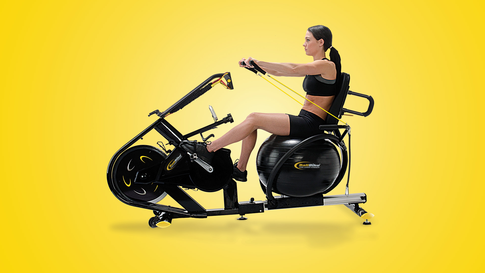 Female on BallBike performing a strength training, core, and cardio workout