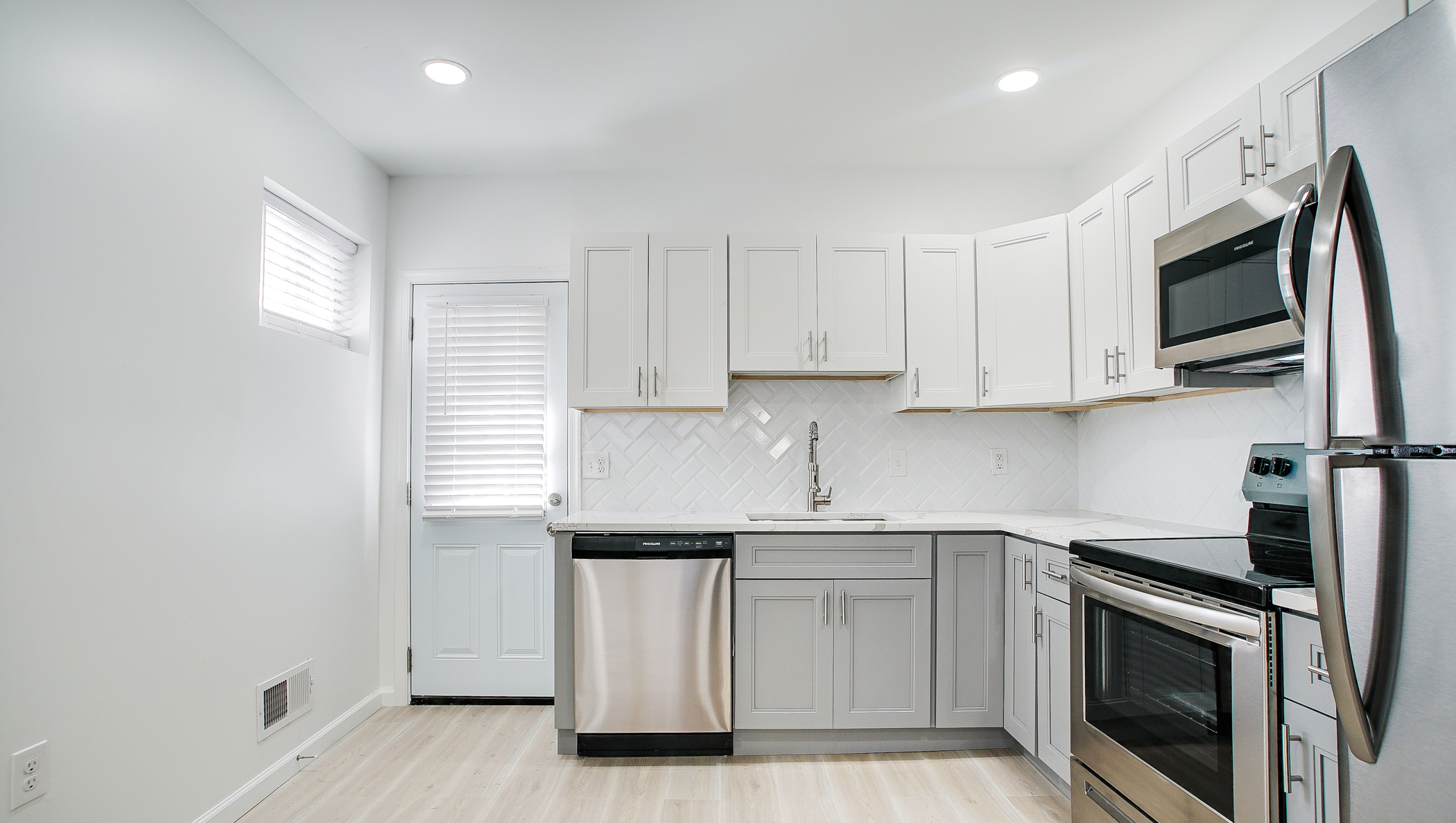 Full rehab of a single-family home in South Philly with space-maximizing layout changes and exterior/interior upgrades.