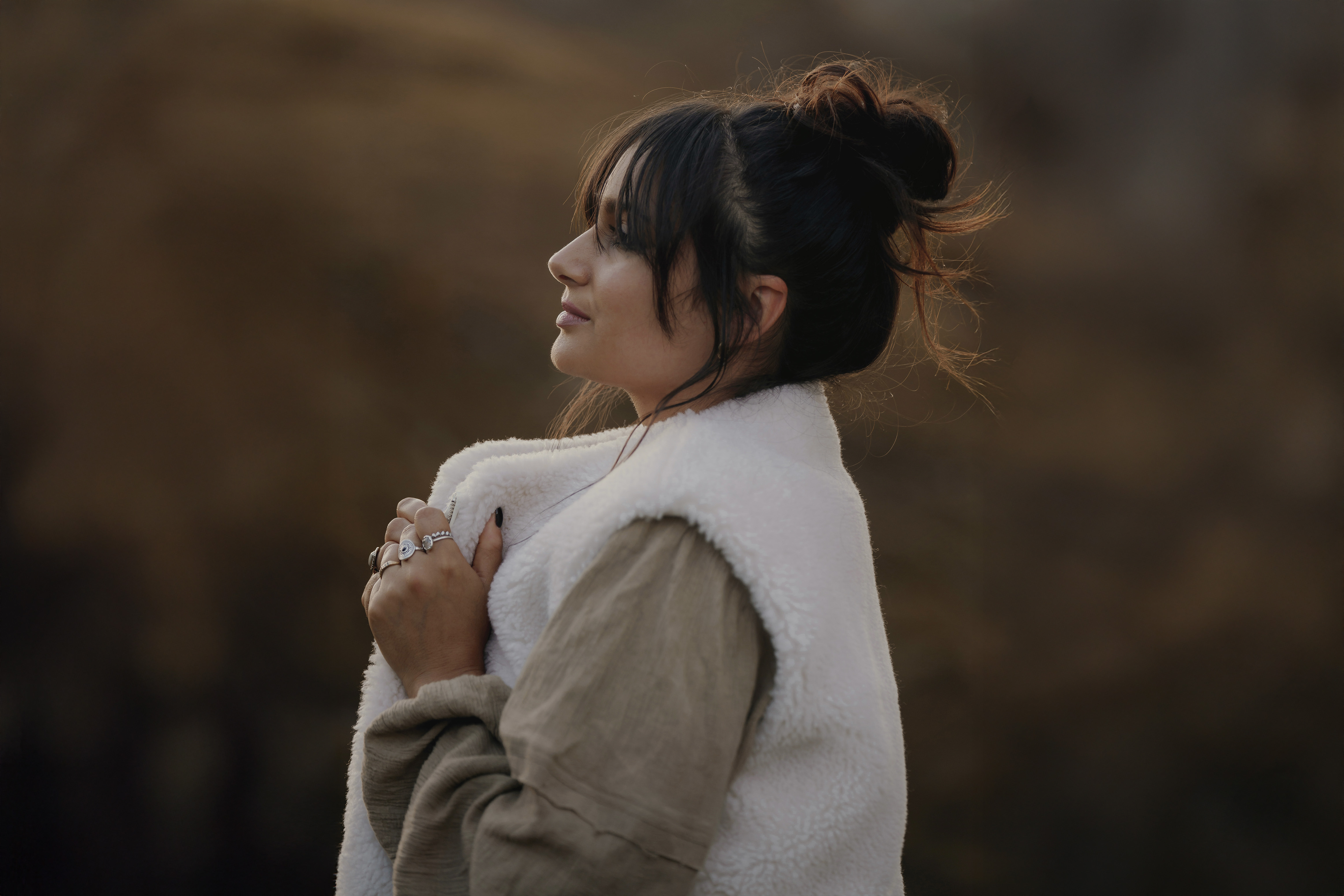 Triangle behind a mountain range made with structural grid like texture