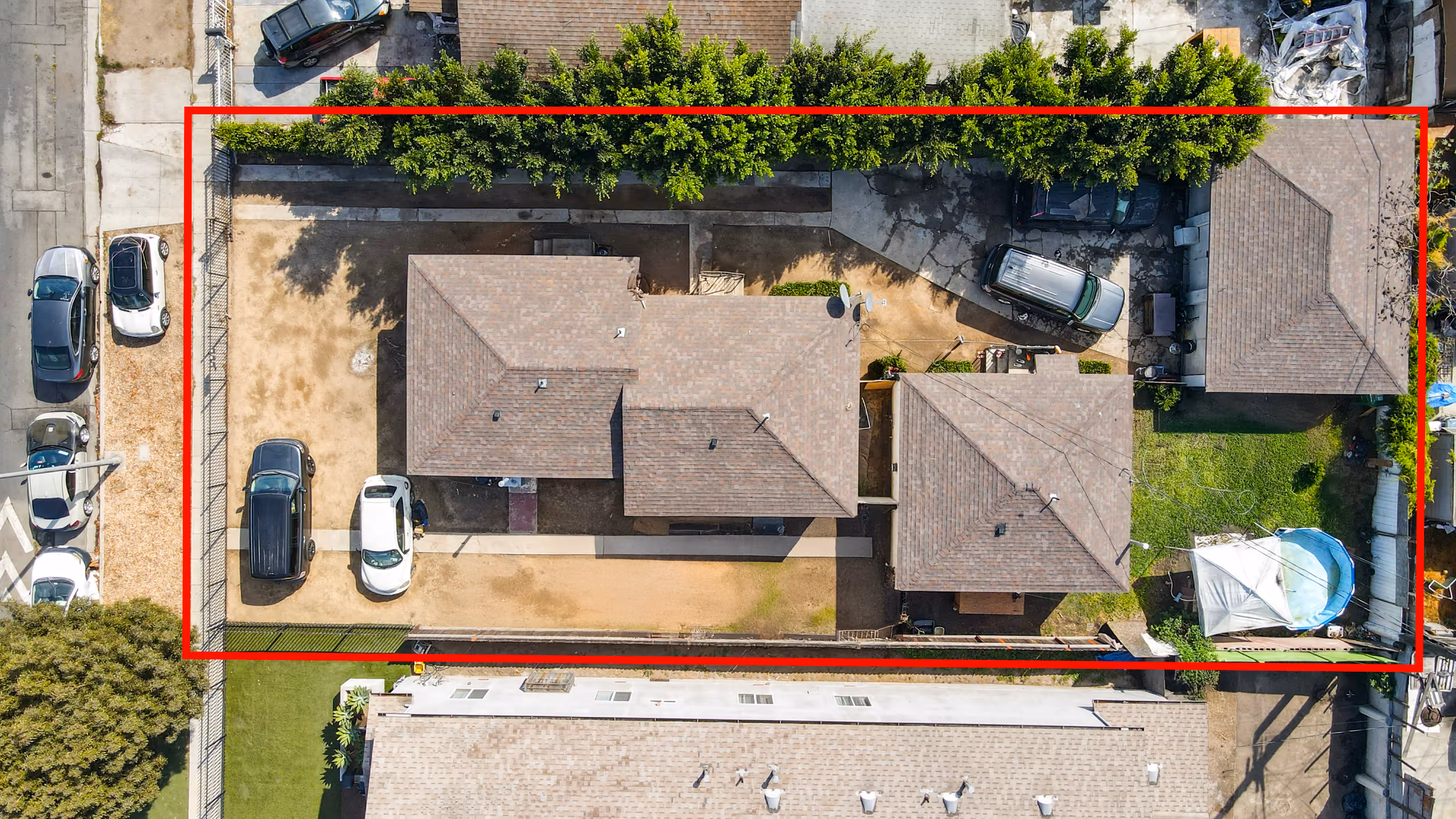 A drone shot of a value add triplex for sale in Los Angeles