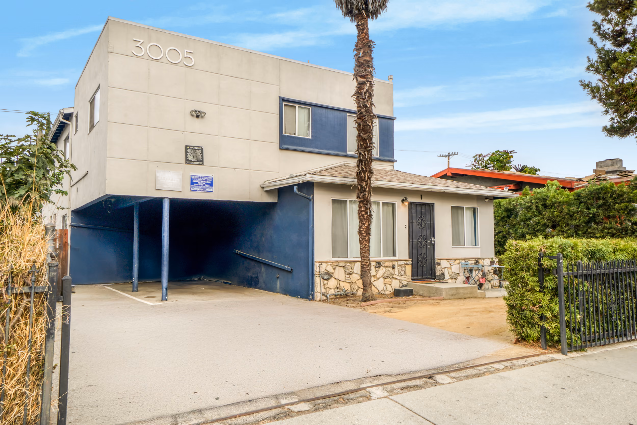 8-unit multifamily apartment building at 3005 S Normandie Ave, Los Angeles, CA 90007