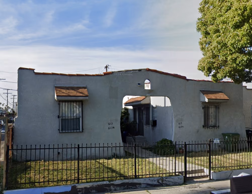 4-unit multifamily apartment building at 613 E 83rd St, Los Angeles, CA 90001